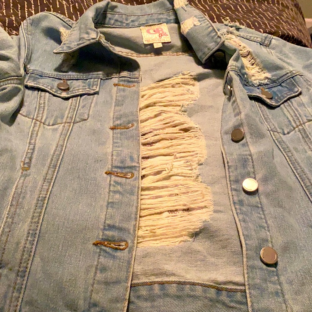 Brand new Ripped denim jacket